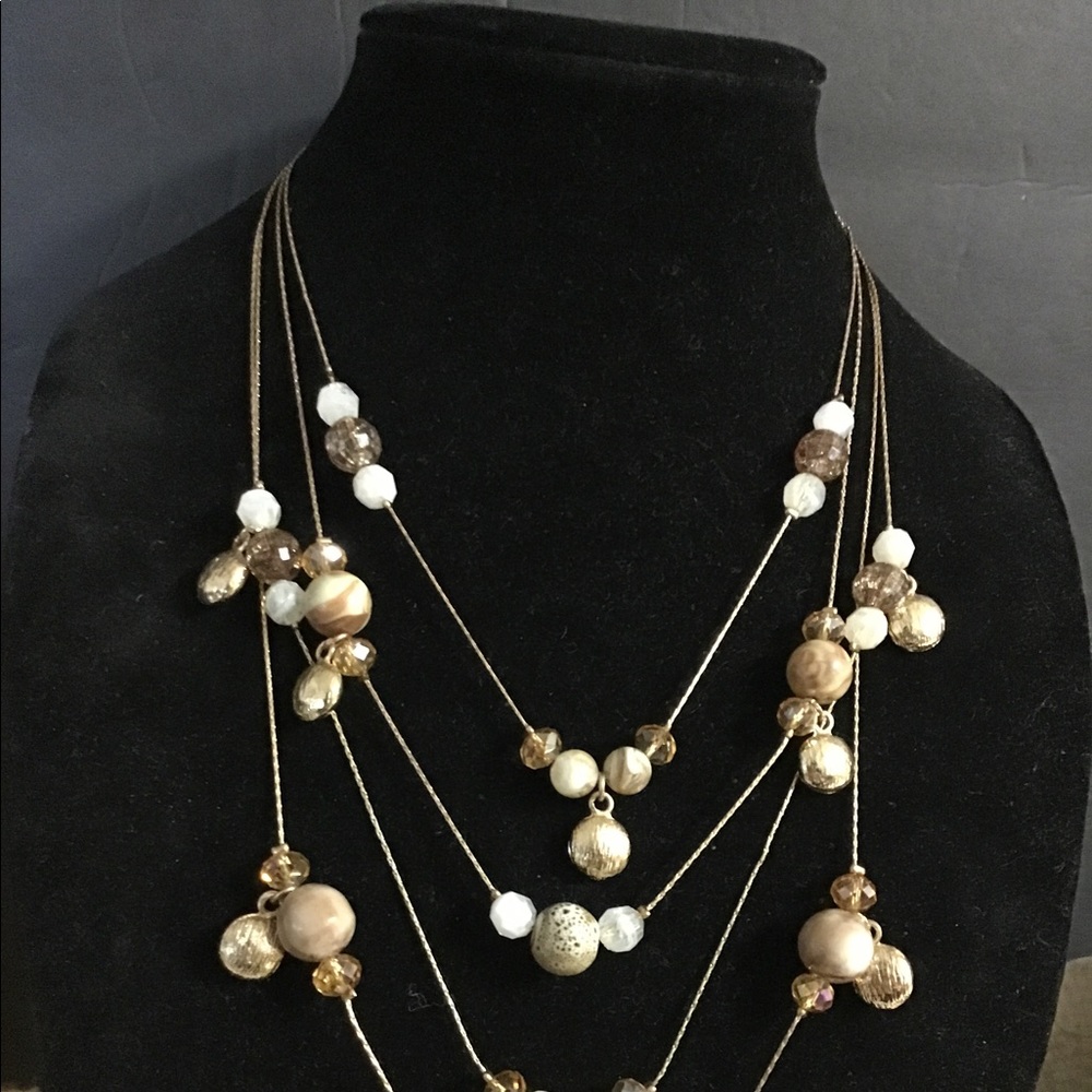 Super gorgeous 4 strands gold tone with beautiful stones and crystals Necklace.